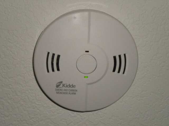 Combination smoke and carbon monoxide detectors are installed on both ...